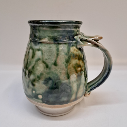 #250719 Mug Green & Mauve $19 at Hunter Wolff Gallery