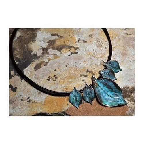EC-021Necklace Detailed Sculptural Leaves Graduated On Rawhide $175 at Hunter Wolff Gallery