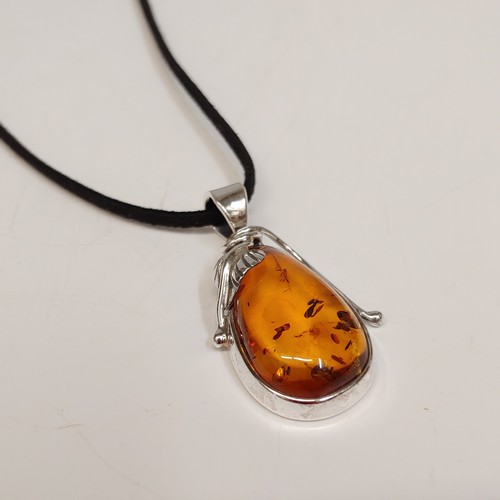 Click to view detail for HWG-105 Pendant, Dark Amber, Pear Shape; Silver Leaf Accent $88