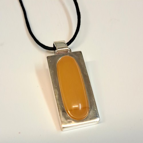 Click to view detail for HWG-2308 Pendant, Yellow Amber Oval in Silver Rectangle $105