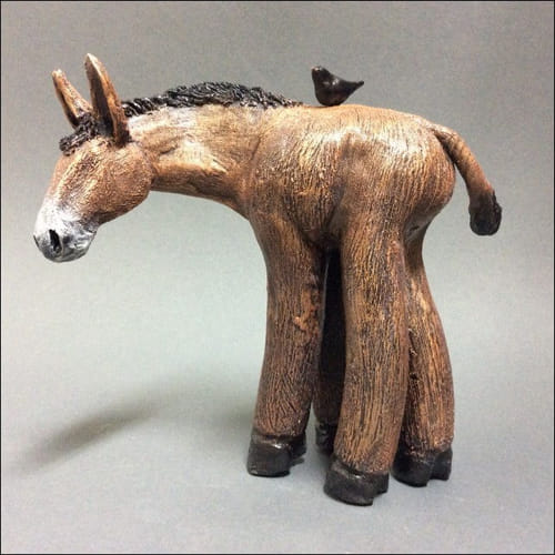 Click to view detail for Little Brown Burro with Black Bird