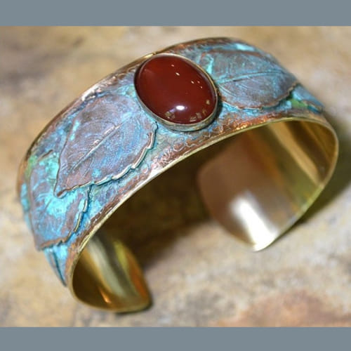 Click to view detail for EC-049 Cuff, Overlapping Leaves with Carnelian $90